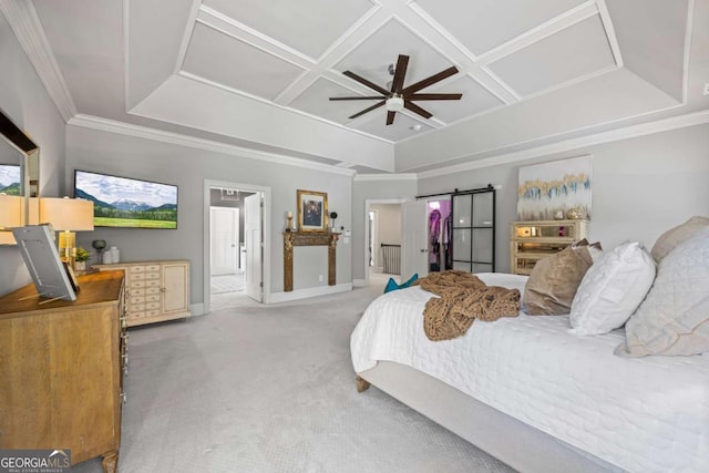 bedroom featuring carpet floors, a barn door, coffered ceiling, and crown molding