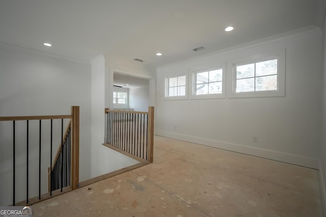 empty room with ornamental molding, recessed lighting, visible vents, and baseboards