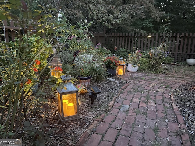 view of patio / terrace featuring fence