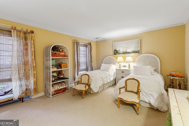 carpeted bedroom featuring baseboards and crown molding