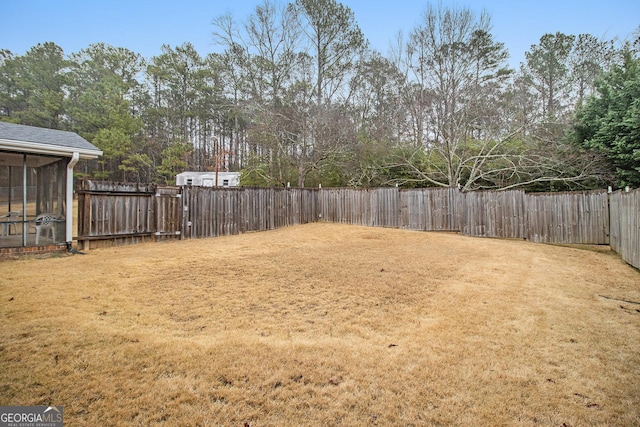 view of yard featuring a fenced backyard