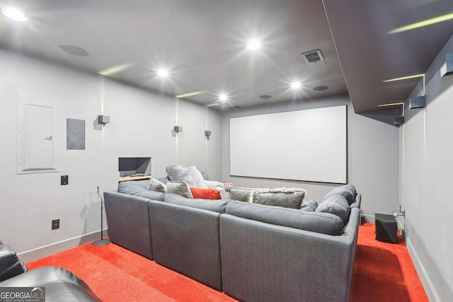 home theater featuring visible vents, electric panel, recessed lighting, carpet flooring, and baseboards