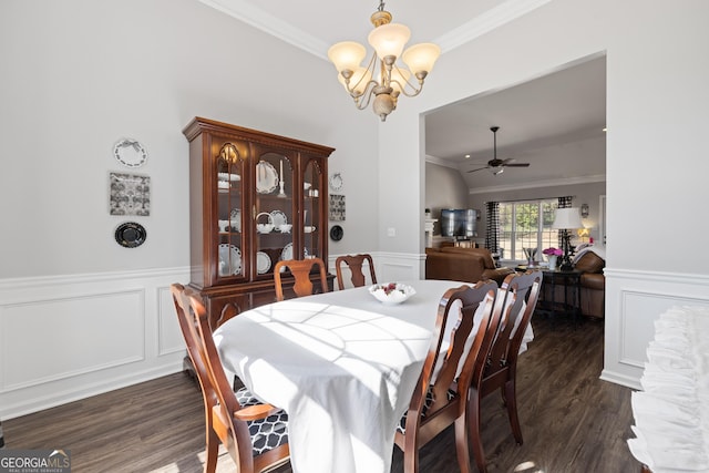 dining room with a wainscoted wall, dark wood-style flooring, and crown molding