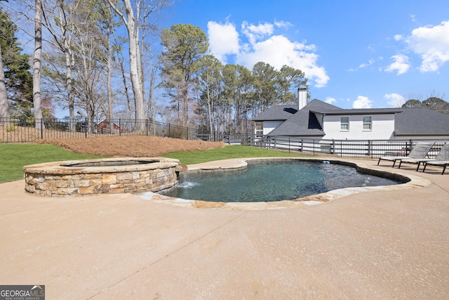 view of pool featuring a patio area, a lawn, fence, and a fenced in pool