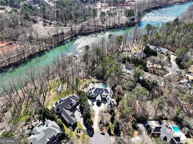 aerial view featuring a water view