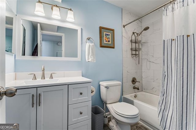 bathroom featuring toilet, shower / tub combo with curtain, and vanity