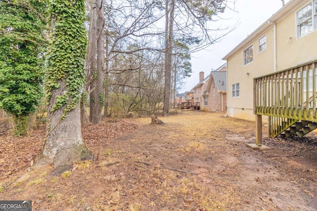 view of yard with a deck