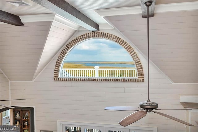 room details featuring visible vents, beamed ceiling, wooden walls, and ceiling fan