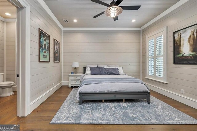 174 Bartram Way, Waverly, GA 31565 - bedroom featuring wooden walls, dark wood-style flooring, ornamental molding, recessed lighting, and ceiling fan