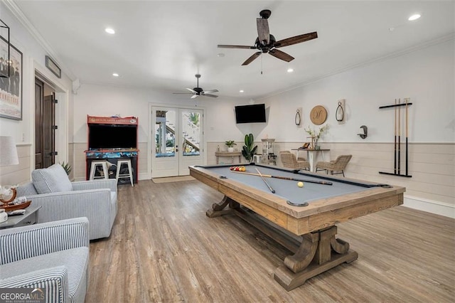 rec room with french doors, a wainscoted wall, crown molding, pool table, and wood finished floors