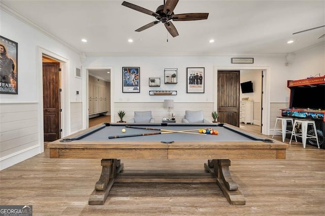 recreation room featuring billiards, wainscoting, wood finished floors, crown molding, and recessed lighting