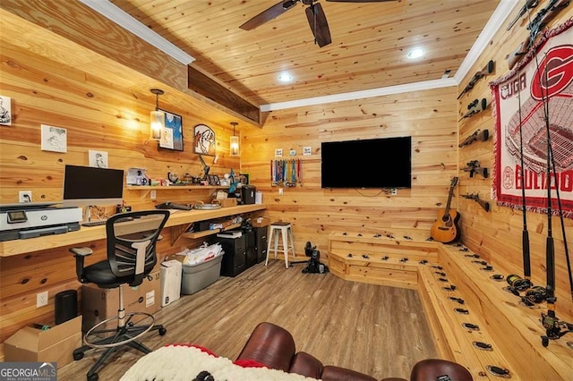 office space with wood walls, wood ceiling, a ceiling fan, and wood finished floors