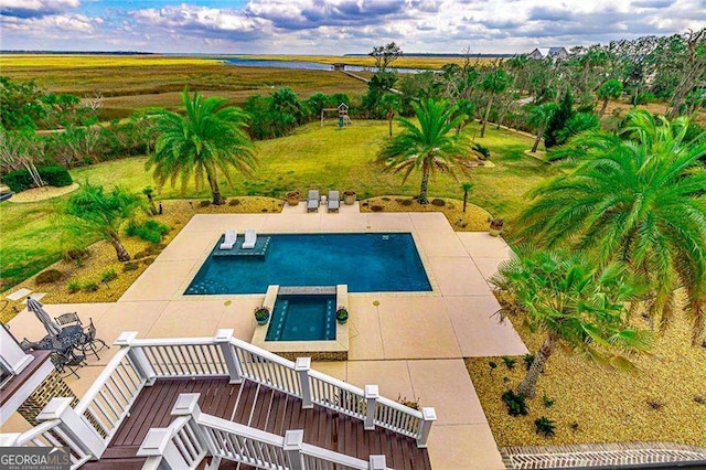 outdoor pool with a patio