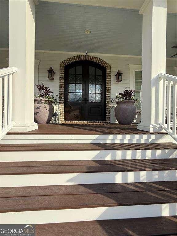 property entrance with a porch