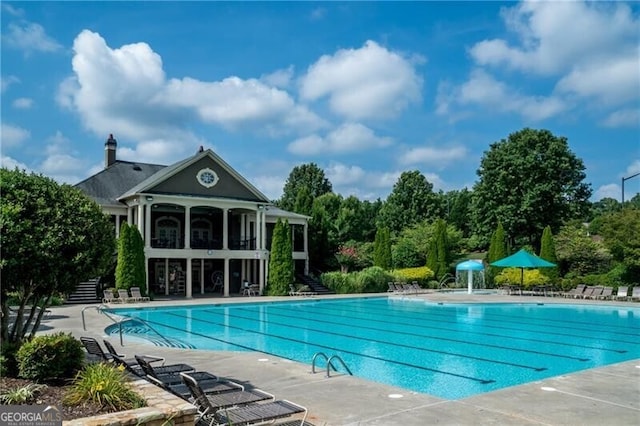 pool featuring a patio area