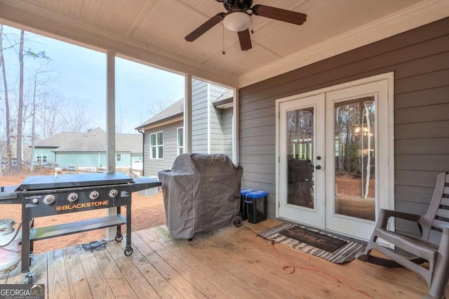 deck with ceiling fan, french doors, and grilling area