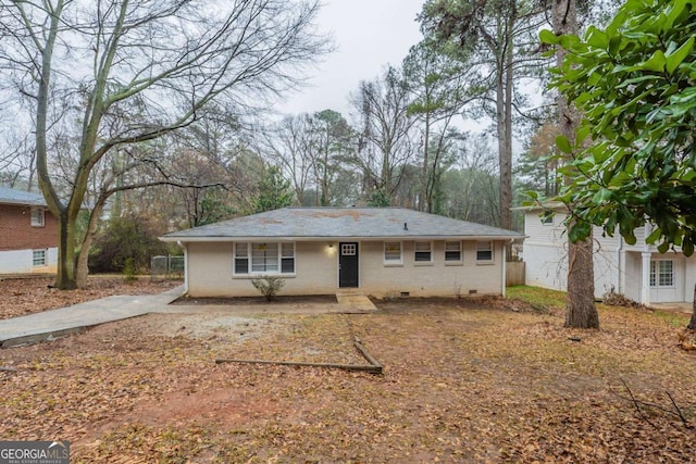 view of front of home featuring crawl space