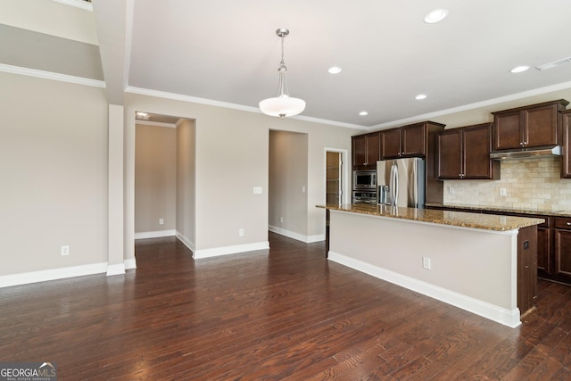 kitchen with dark brown cabinets, appliances with stainless steel finishes, visible vents, and a center island