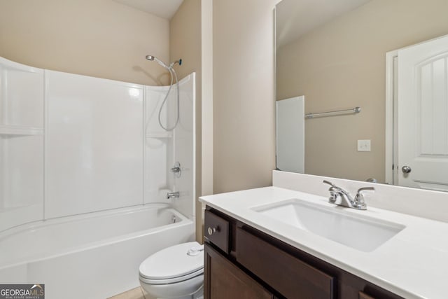 full bathroom featuring toilet, shower / bathing tub combination, and vanity