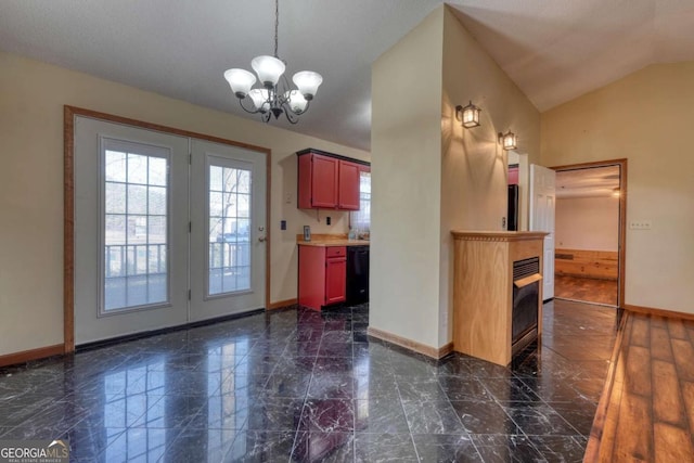 kitchen with black dishwasher, baseboards, marble finish floor, an inviting chandelier, and vaulted ceiling