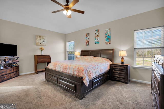 152 Summerhill Dr NE, Ludowici, GA 31316 - bedroom featuring light carpet, a ceiling fan, and baseboards