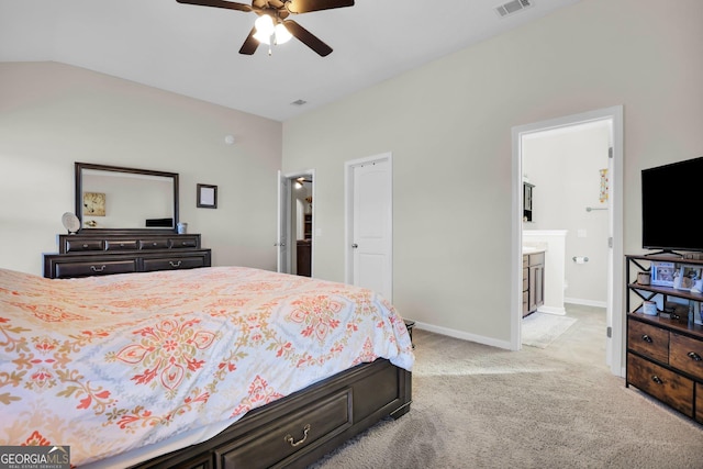 152 Summerhill Dr NE, Ludowici, GA 31316 - bedroom featuring light colored carpet, visible vents, ensuite bathroom, vaulted ceiling, and baseboards