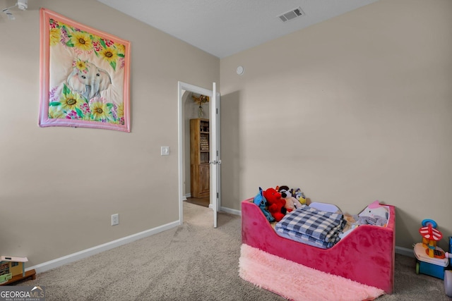 152 Summerhill Dr NE, Ludowici, GA 31316 - bedroom with carpet floors, baseboards, and visible vents