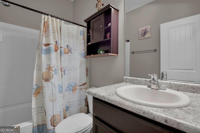 152 Summerhill Dr NE, Ludowici, GA 31316 - bathroom with toilet, shower / tub combo with curtain, and vanity