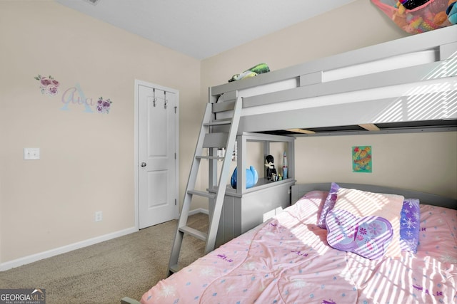 152 Summerhill Dr NE, Ludowici, GA 31316 - bedroom featuring carpet floors and baseboards