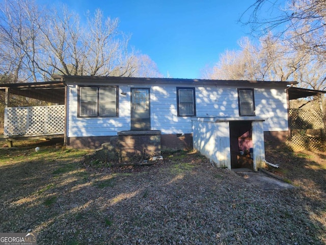 exterior space featuring an attached carport