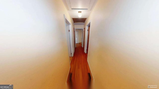 hallway featuring attic access