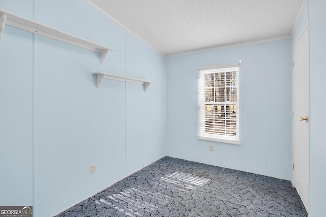 empty room with a textured ceiling
