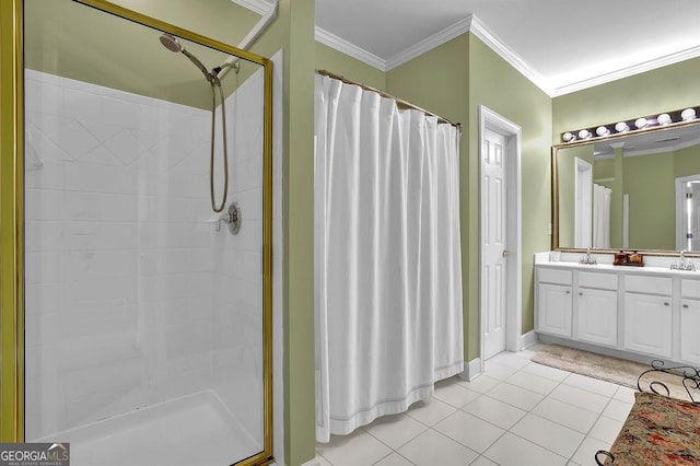 bathroom featuring double vanity, a shower with shower curtain, ornamental molding, tile patterned flooring, and a sink