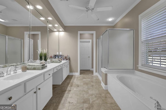 full bathroom featuring crown molding, a sink, and a shower stall