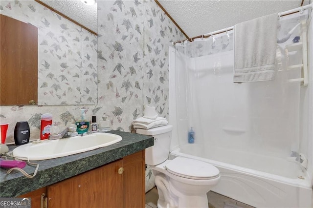 bathroom with a textured ceiling, toilet, shower / tub combo, vanity, and wallpapered walls