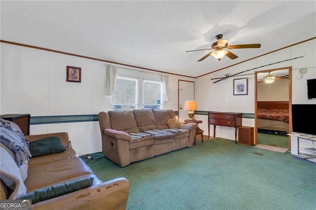 living room featuring a textured ceiling, carpet floors, ornamental molding, and vaulted ceiling