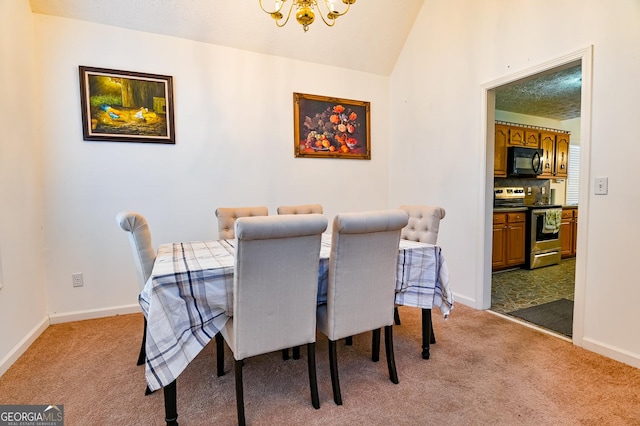 carpeted dining space featuring lofted ceiling, baseboards, and a chandelier