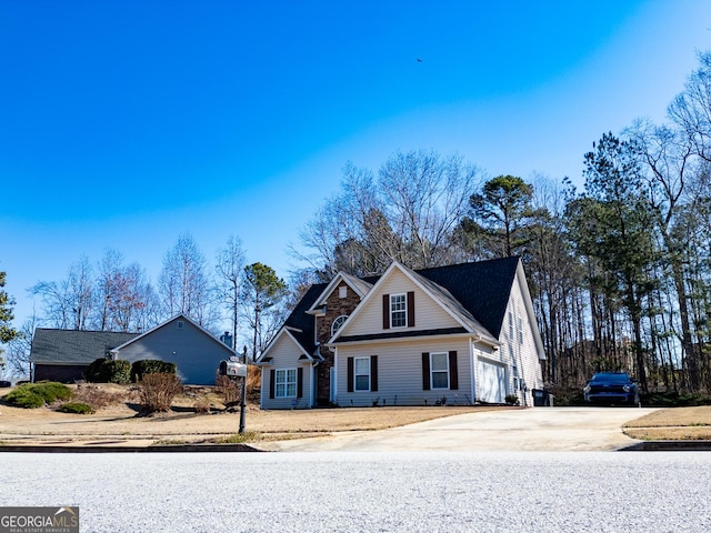 view of front of home with a garage and driveway