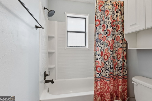 bathroom with toilet and shower / bath combo with shower curtain