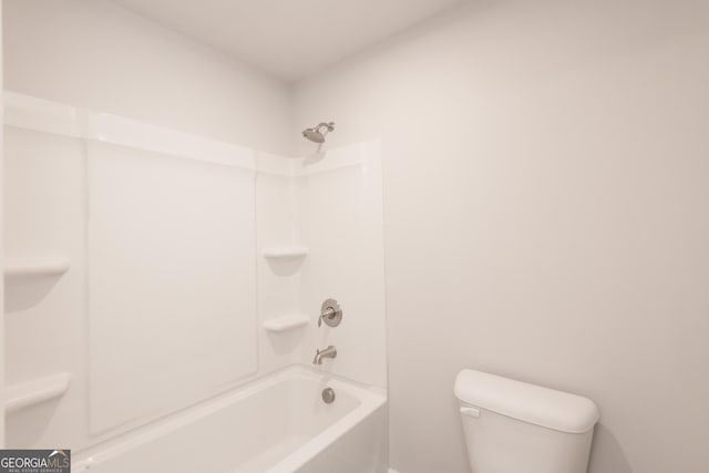 full bathroom featuring bathing tub / shower combination and toilet