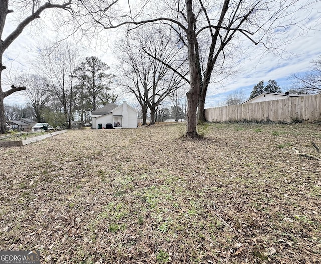 view of yard featuring fence