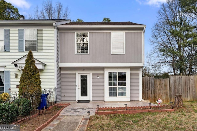 view of front of property with fence