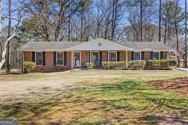 ranch-style house featuring crawl space, a front lawn, and brick siding