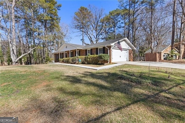 ranch-style home with a garage, concrete driveway, brick siding, and a front yard