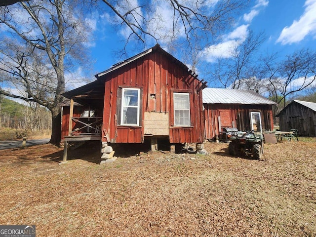 view of property exterior with board and batten siding