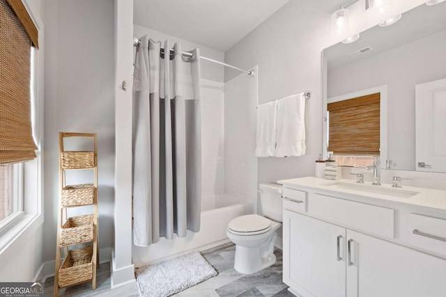 bathroom with toilet, vanity, visible vents, and shower / tub combo with curtain