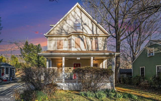 view of front of house with covered porch and ceiling fan