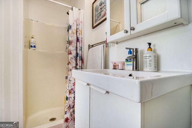 bathroom with a stall shower