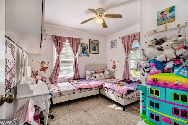 bedroom featuring ceiling fan