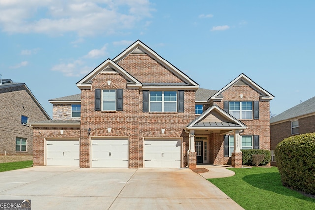 view of front facade featuring a garage, brick siding, a shingled roof, driveway, and a front yard